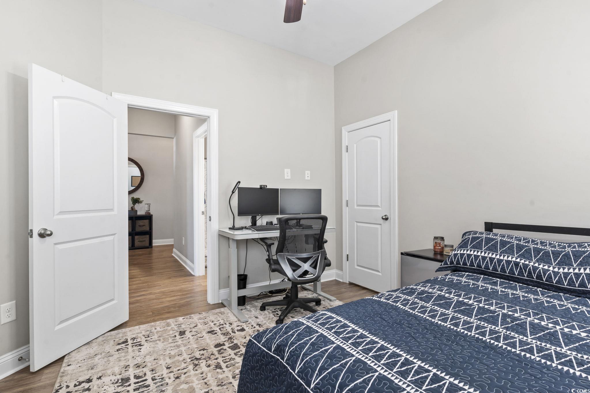 308 Turning Pines Loop Myrtle Beach, SC 29579 - Photo 23 of 33 Bedroom featuring ceiling fan and wood-type floori