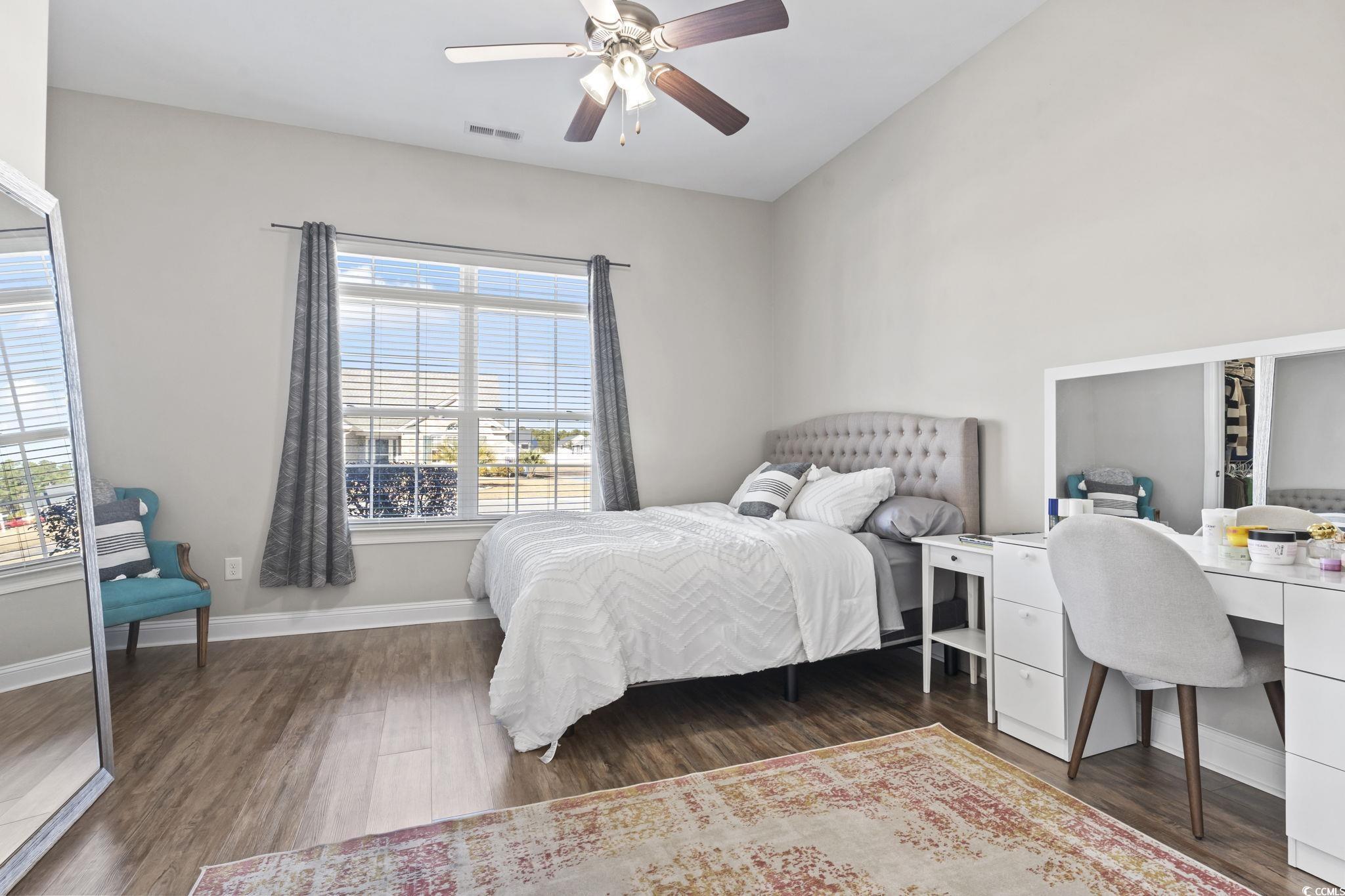308 Turning Pines Loop Myrtle Beach, SC 29579 - Photo 25 of 33 Bedroom featuring ceiling fan and dark hardwood /