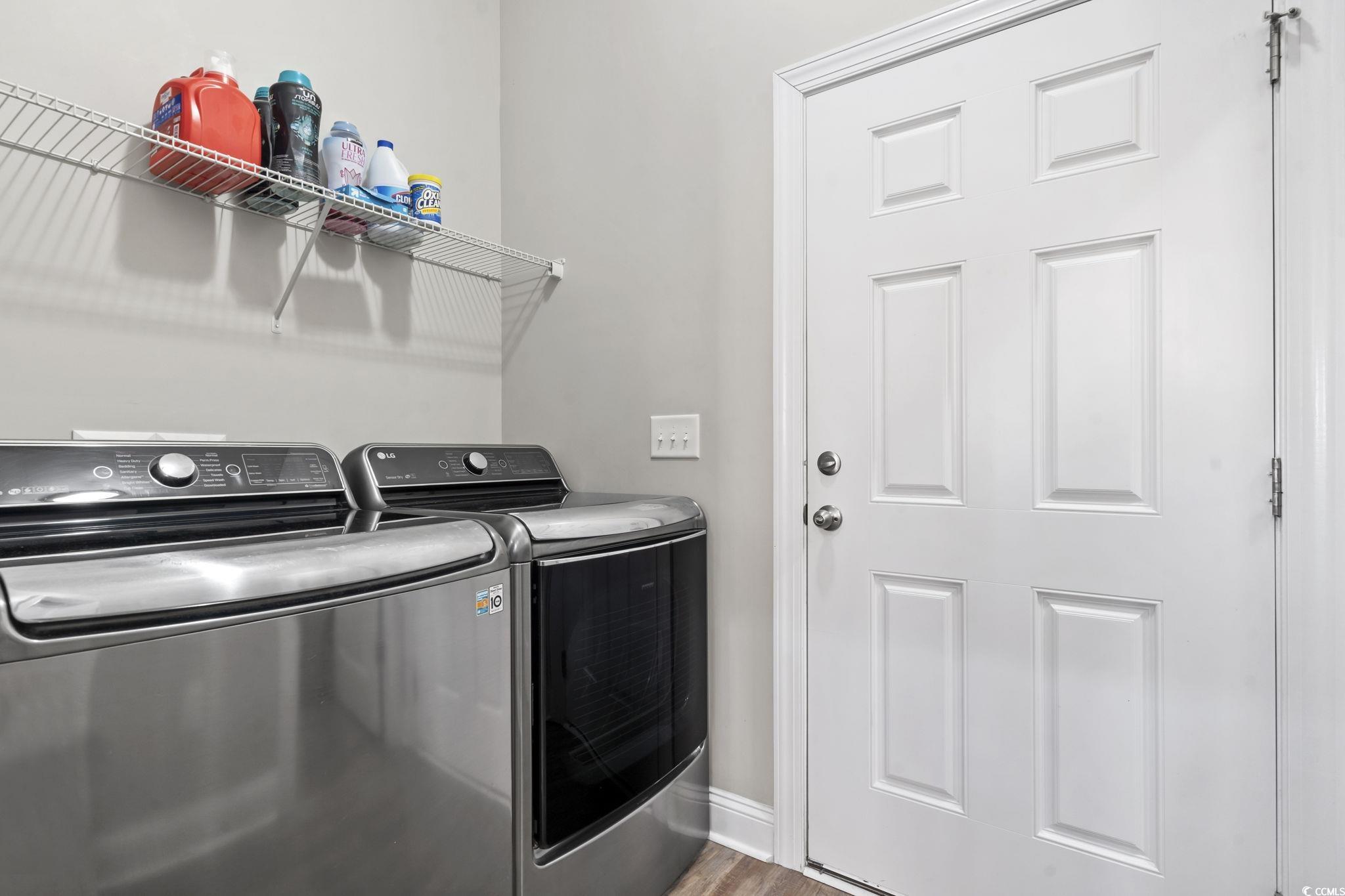 308 Turning Pines Loop Myrtle Beach, SC 29579 - Photo 28 of 33 Clothes washing area with washer and dryer and woo