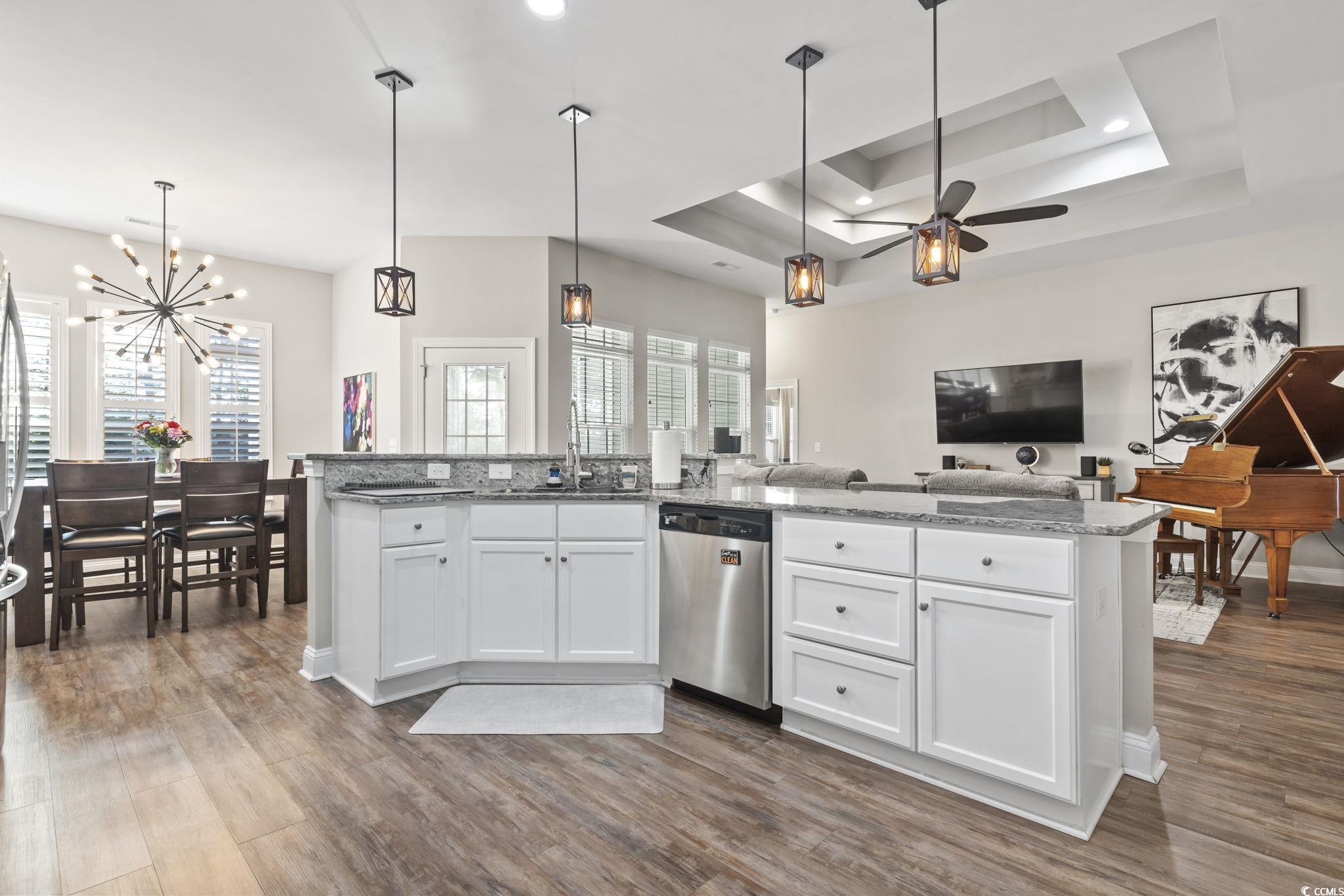 308 Turning Pines Loop Myrtle Beach, SC 29579 - Photo 4 of 33 Kitchen with decorative light fixtures, white cabi