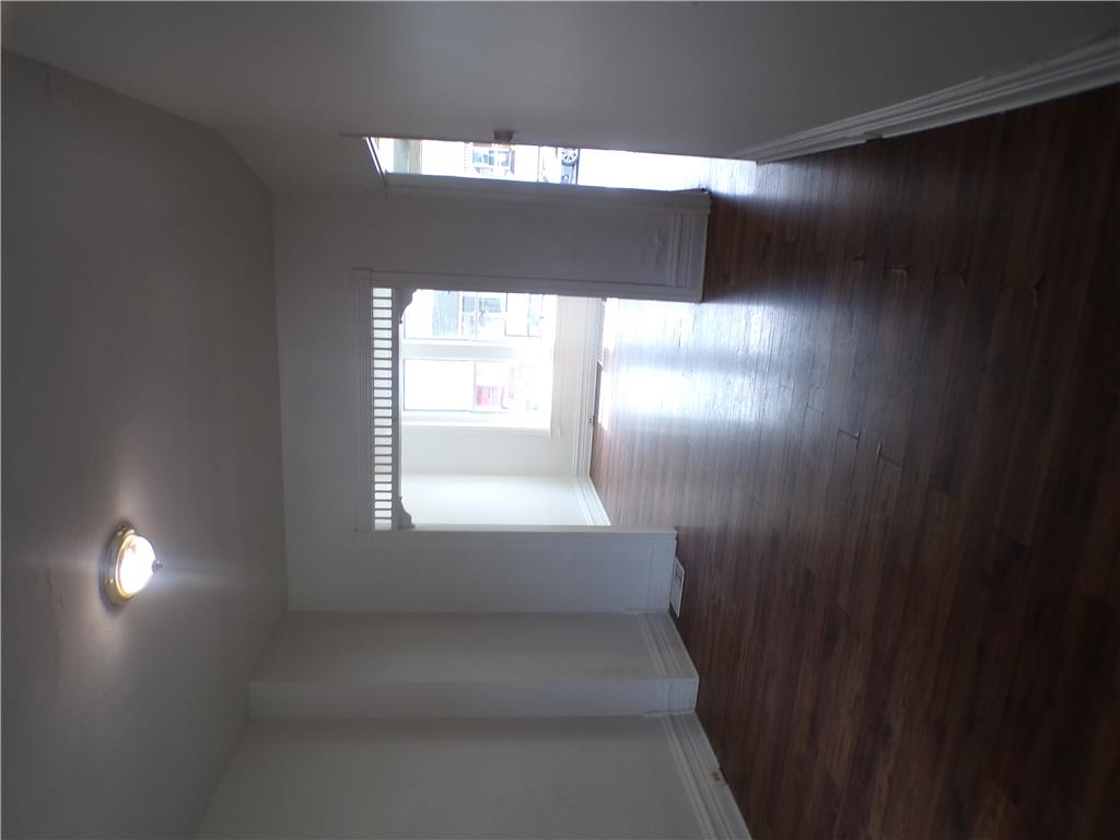 111 Ridge Avenue Allentown, PA 18102 - Photo 4 of 15 Rich hardwood flooring leads to a bright, inviting space.