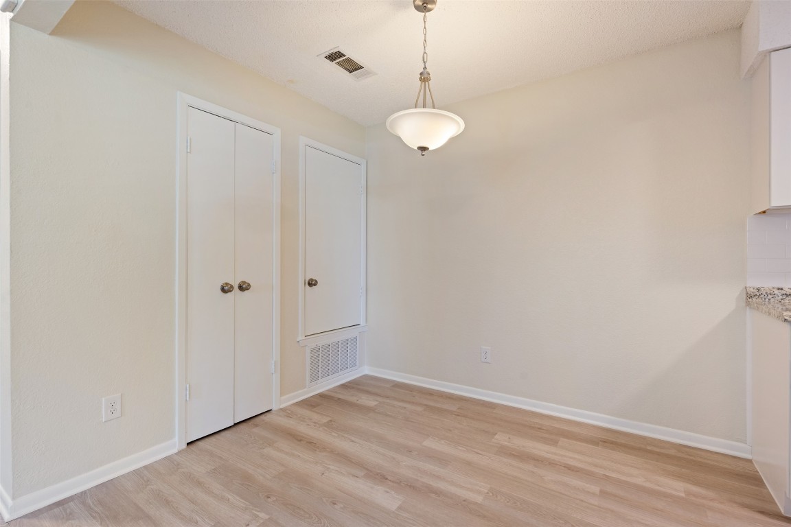 608 Country Aire Drive, Unit A Round Rock, TX 78664 - Photo 12 of 32 a view of an empty room with a window