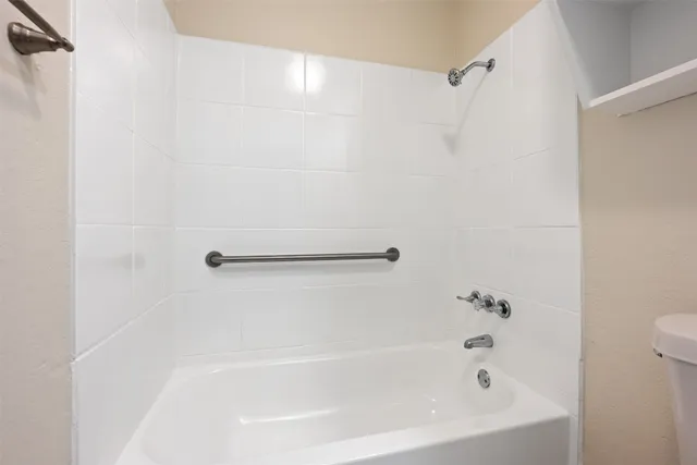 a bathroom with a bathtub