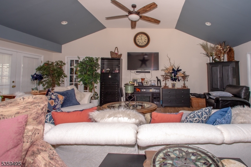 76 Glen Road Wantage, NJ 07461 - Photo 20 of 47 a living room with furniture and a large window