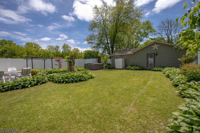 76 Glen Road Wantage, NJ 07461 - Photo 2 of 47 a view of backyard with garden and trees