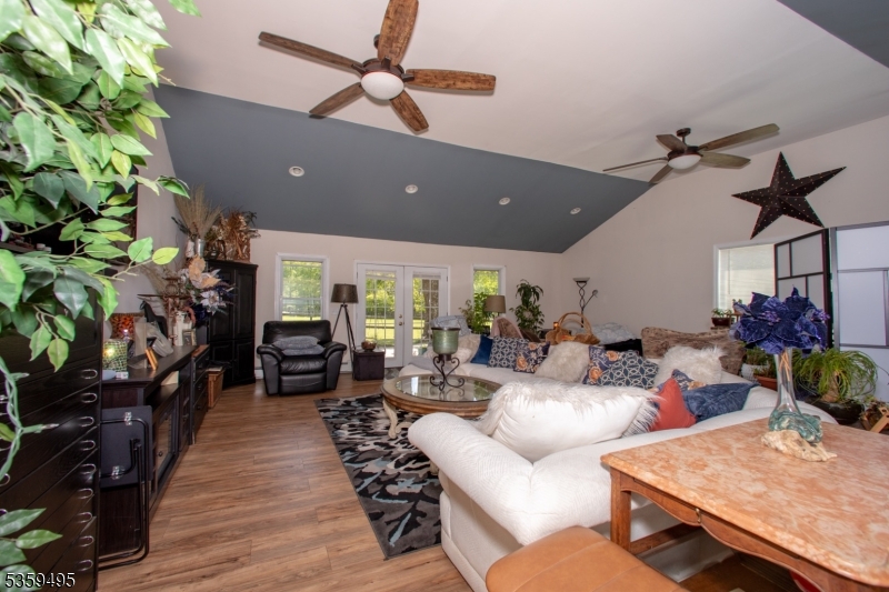 76 Glen Road Wantage, NJ 07461 - Photo 22 of 47 a living room with furniture and a potted plant