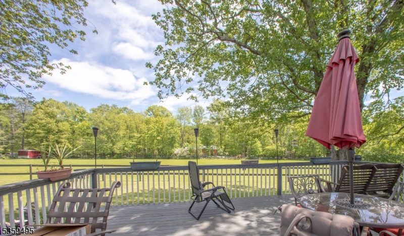 76 Glen Road Wantage, NJ 07461 - Photo 30 of 47 a view of a yard with a chair and table