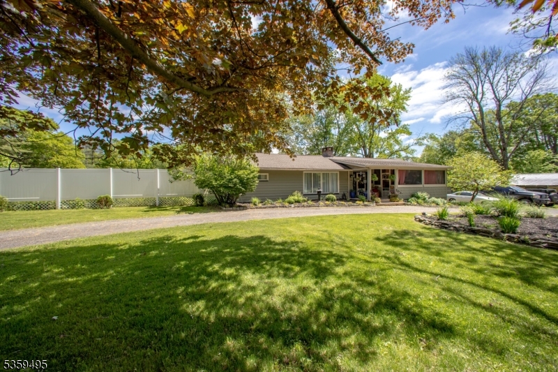 76 Glen Road Wantage, NJ 07461 - Photo 3 of 47 a front view of house with yard and green space