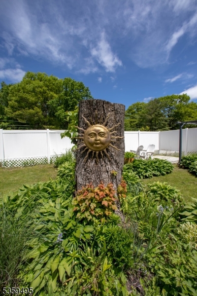 76 Glen Road Wantage, NJ 07461 - Photo 33 of 47 a view of a large yard with a large tree and a yard