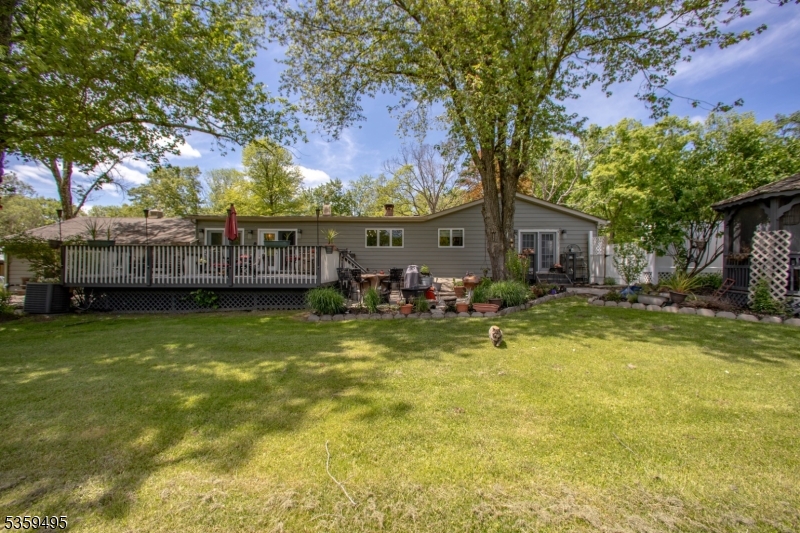 76 Glen Road Wantage, NJ 07461 - Photo 34 of 47 a view of a swimming pool with a patio