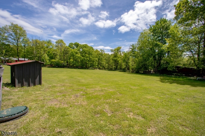 76 Glen Road Wantage, NJ 07461 - Photo 39 of 47 a backyard of a house with lots of green space