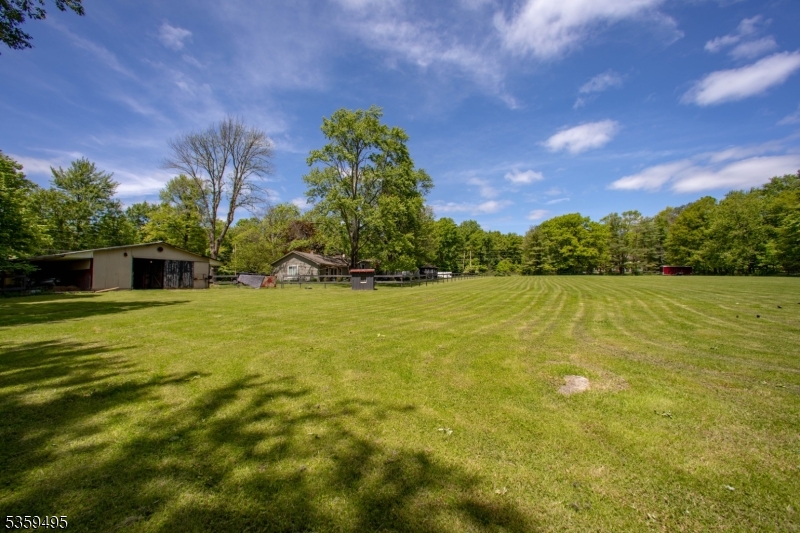 76 Glen Road Wantage, NJ 07461 - Photo 44 of 47 a view of a garden from a building