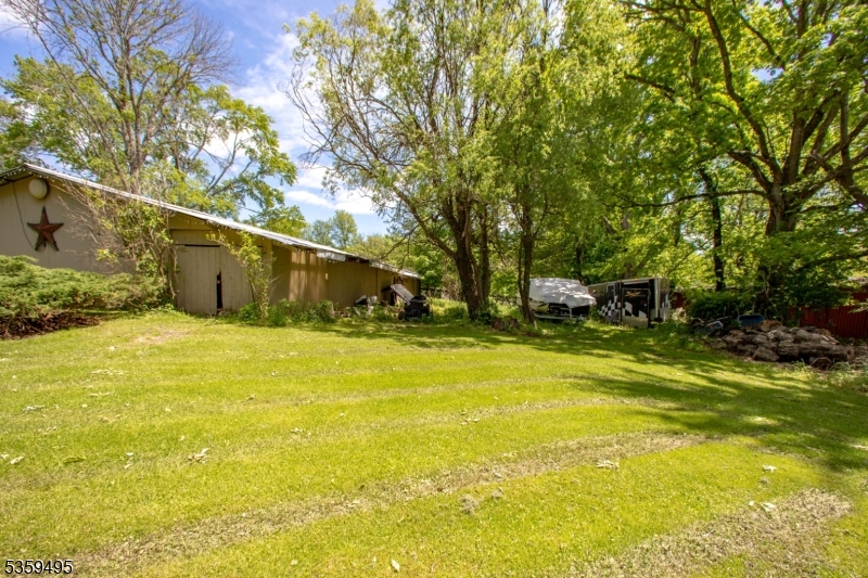 76 Glen Road Wantage, NJ 07461 - Photo 45 of 47 a view of a swimming pool with an outdoor space