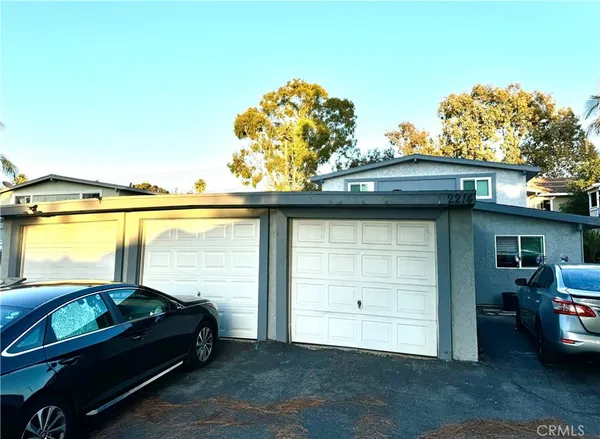 a car parked in front of a house