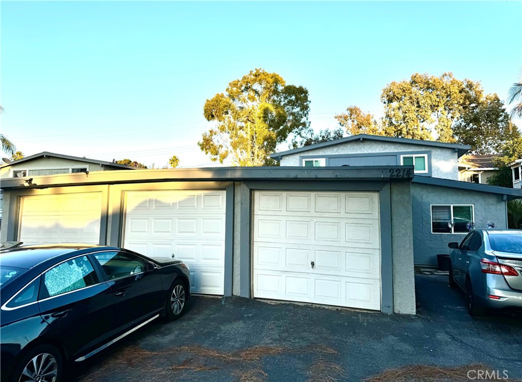 2214 Rutgers Drive Costa Mesa, CA 92627 - Photo 25 of 25 a car parked in front of a house