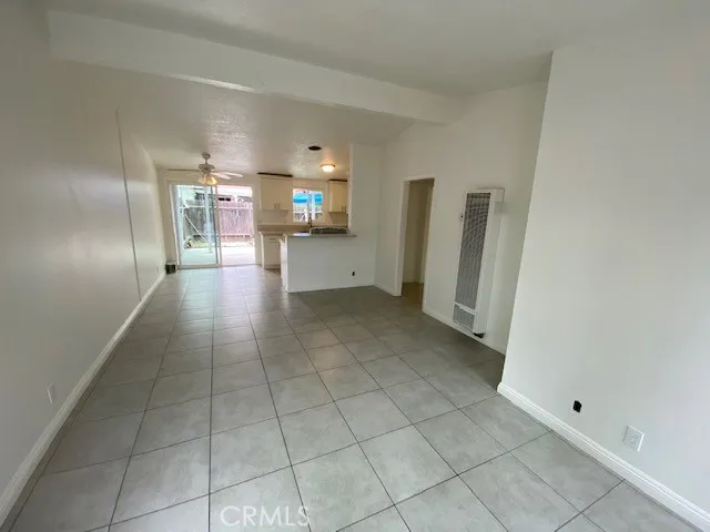 a view of a storage & utility room with windows