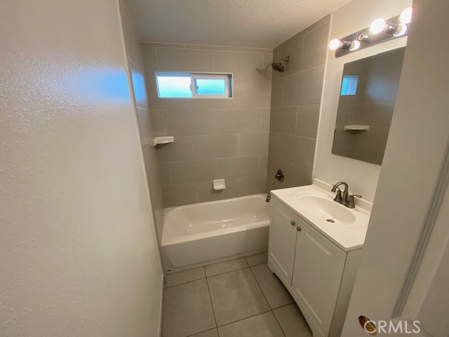 2214 Rutgers Drive Costa Mesa, CA 92627 - Photo 6 of 25 a bathroom with a sink a toilet and shower