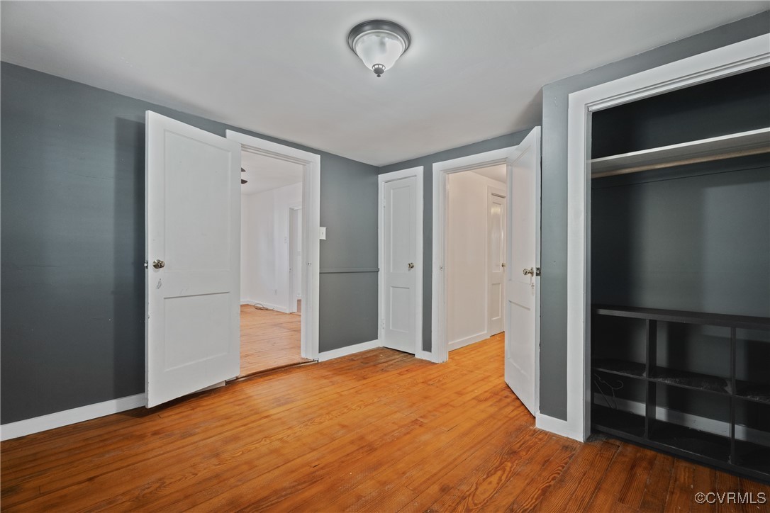 6405 King William Road Aylett, VA 23009 - Photo 20 of 40 Unfurnished bedroom featuring a closet and wood-ty