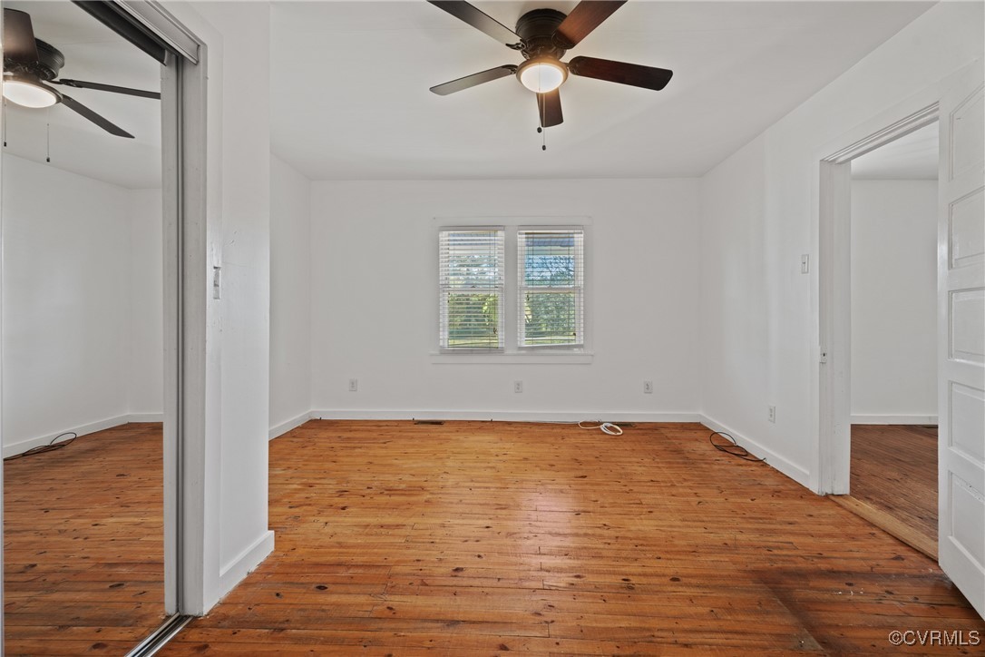 6405 King William Road Aylett, VA 23009 - Photo 23 of 40 Unfurnished bedroom with ceiling fan and light har