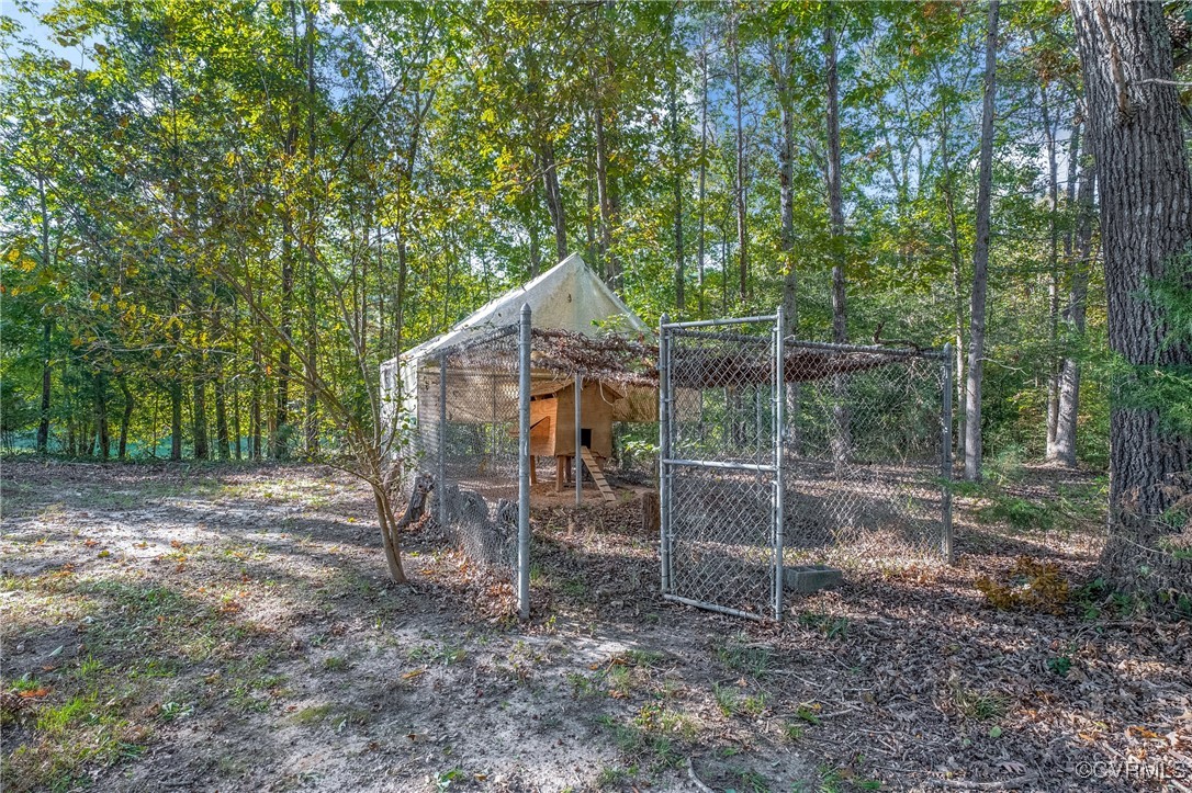 6405 King William Road Aylett, VA 23009 - Photo 31 of 40 Chicken coop and run, concreted in ground