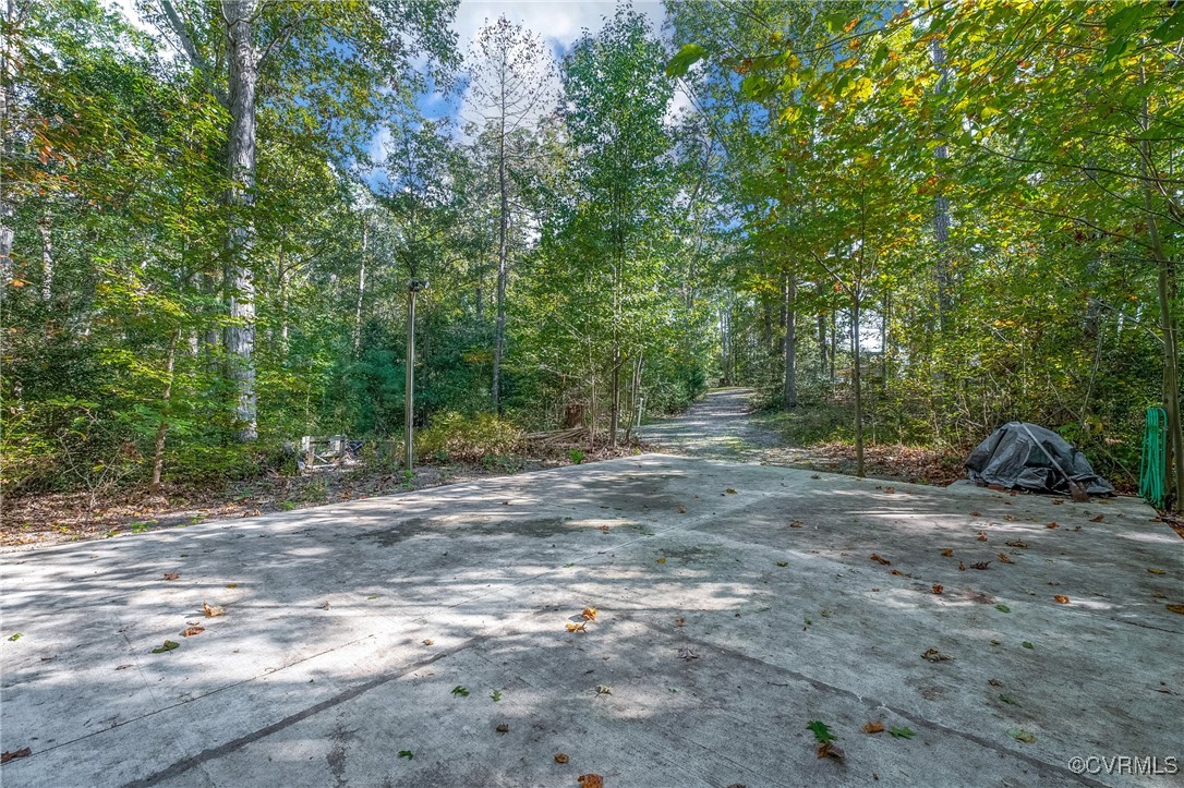 6405 King William Road Aylett, VA 23009 - Photo 32 of 40 20x30 Concrete pad in rear of property.
