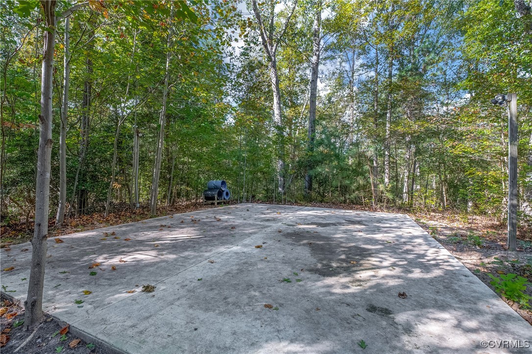 6405 King William Road Aylett, VA 23009 - Photo 33 of 40 20x30 Concrete pad in rear of property.