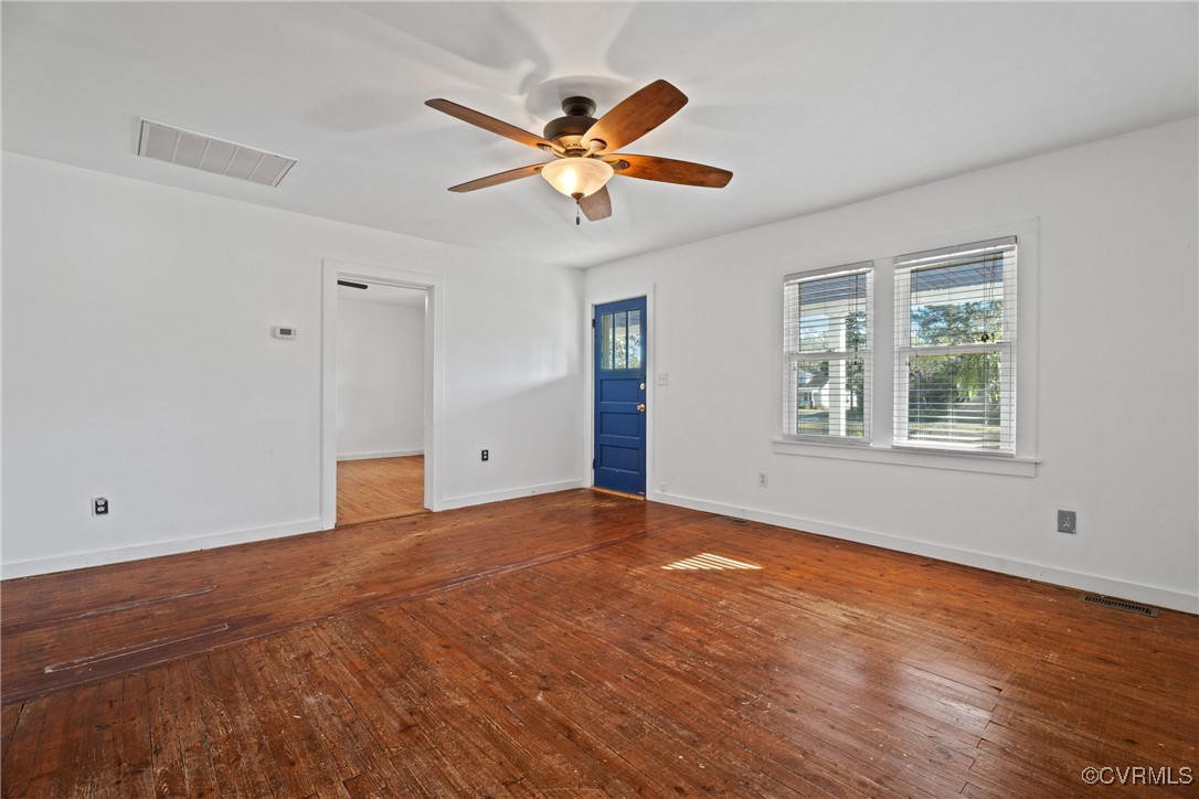 6405 King William Road Aylett, VA 23009 - Photo 9 of 40 Spare room with ceiling fan and hardwood / wood-st