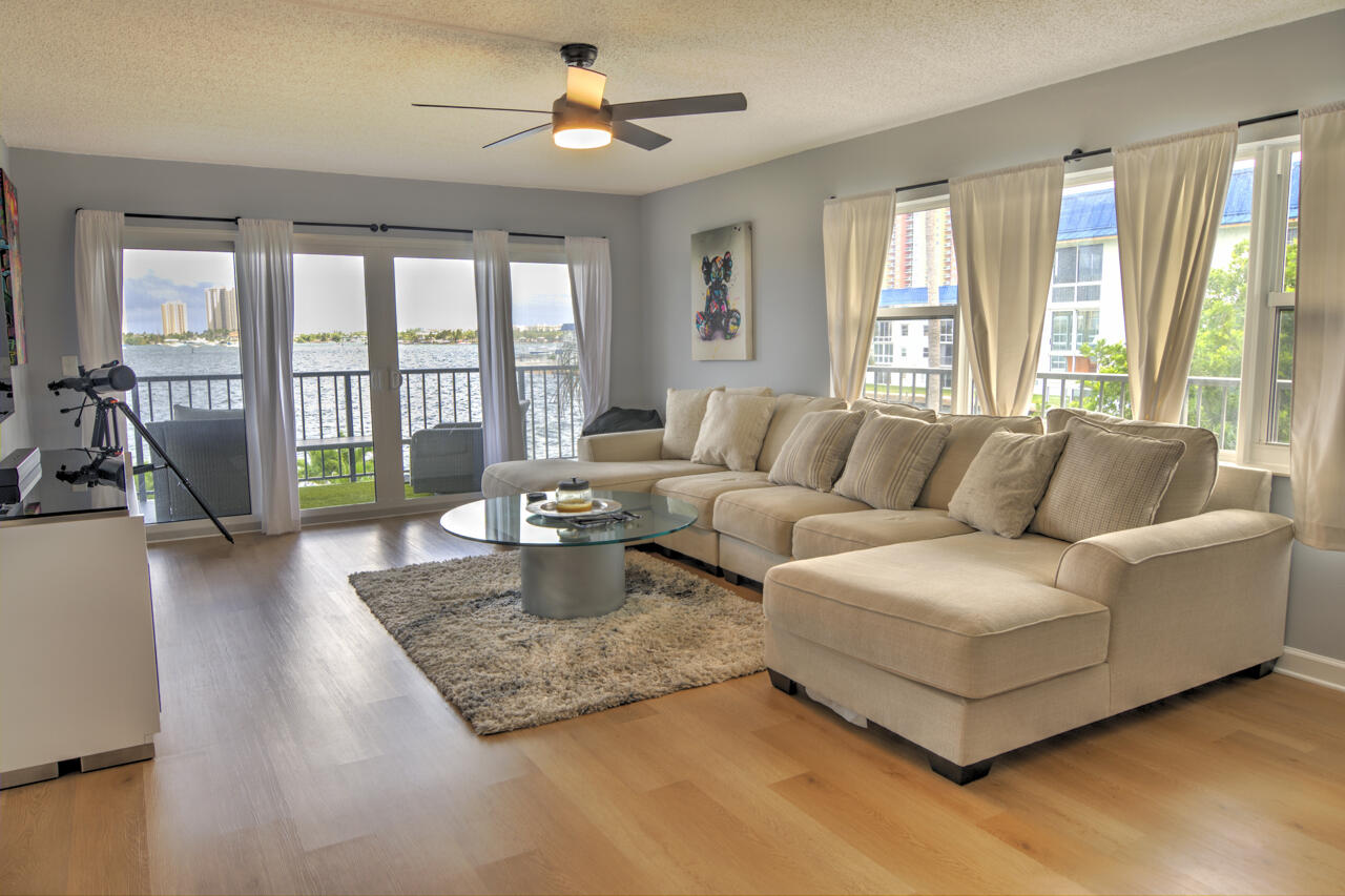 3040 Lake Shore Drive, Unit 305 Riviera Beach, FL 33404 - Photo 7 of 24 16-Still-Living-Room-3