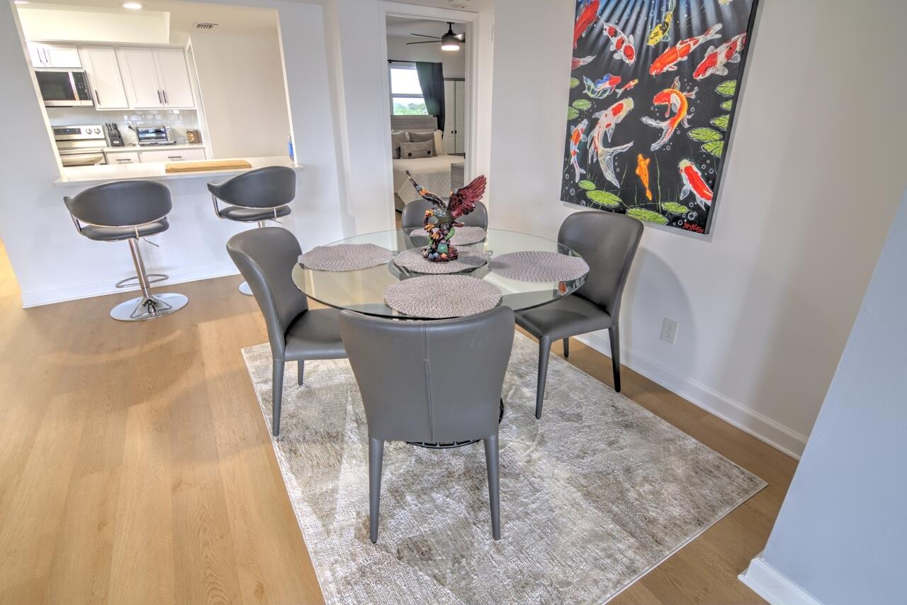 3040 Lake Shore Drive, Unit 305 Riviera Beach, FL 33404 - Photo 10 of 24 6-Still-Dining-2