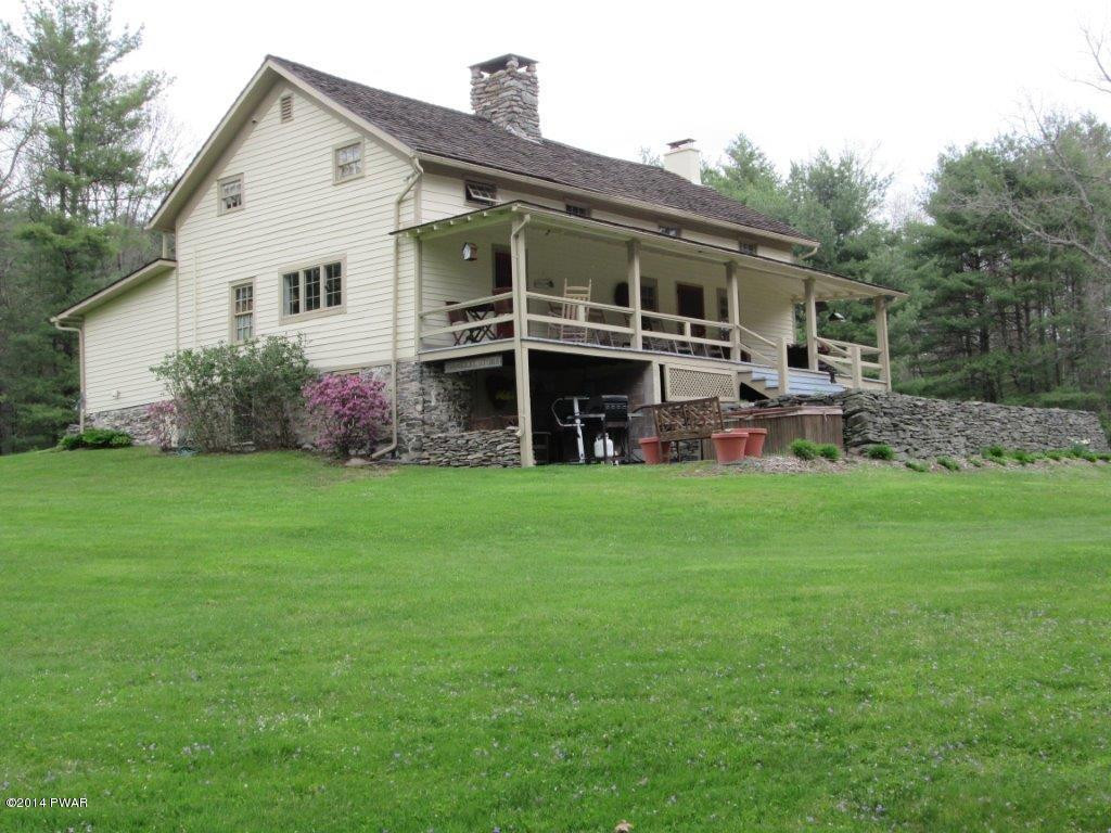 877 Welcome Lake Road Hawley, PA 18428 - Photo 54 of 78 LARGE PORCH AND STONE FOUNDATION