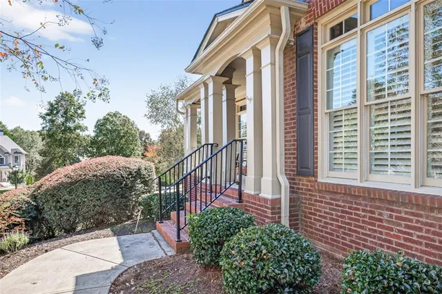 a view of a livingroom with furniture and hardwood floor