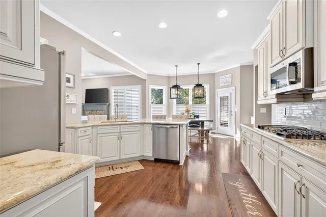 a spacious bathroom with a bathtub and a toilet