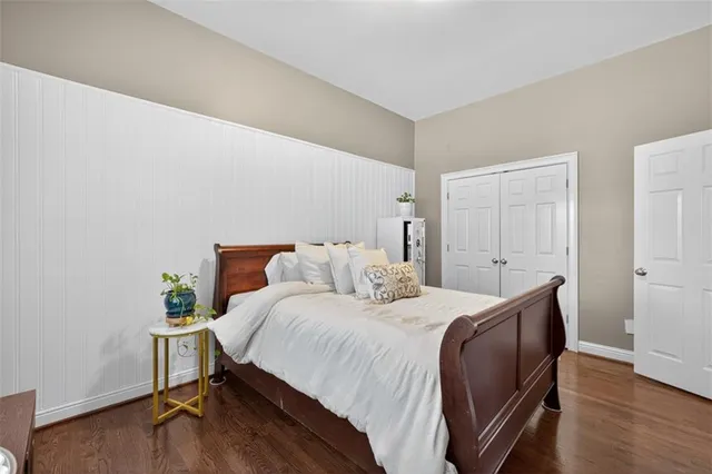 a bathroom with a double vanity sink mirror and toilet