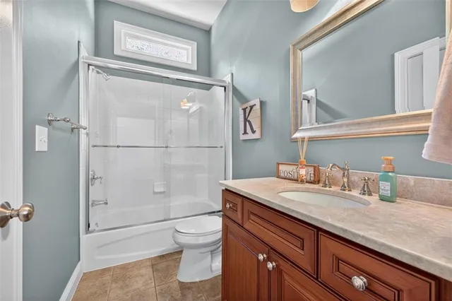 a bedroom with two beds and a dresser