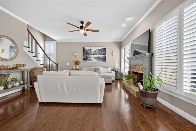 a bedroom with a bed and a chair