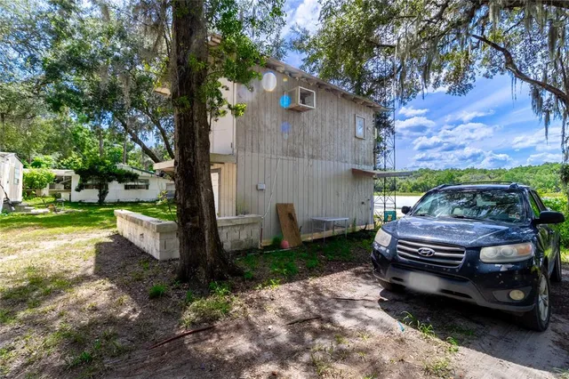 a house with trees in front of it