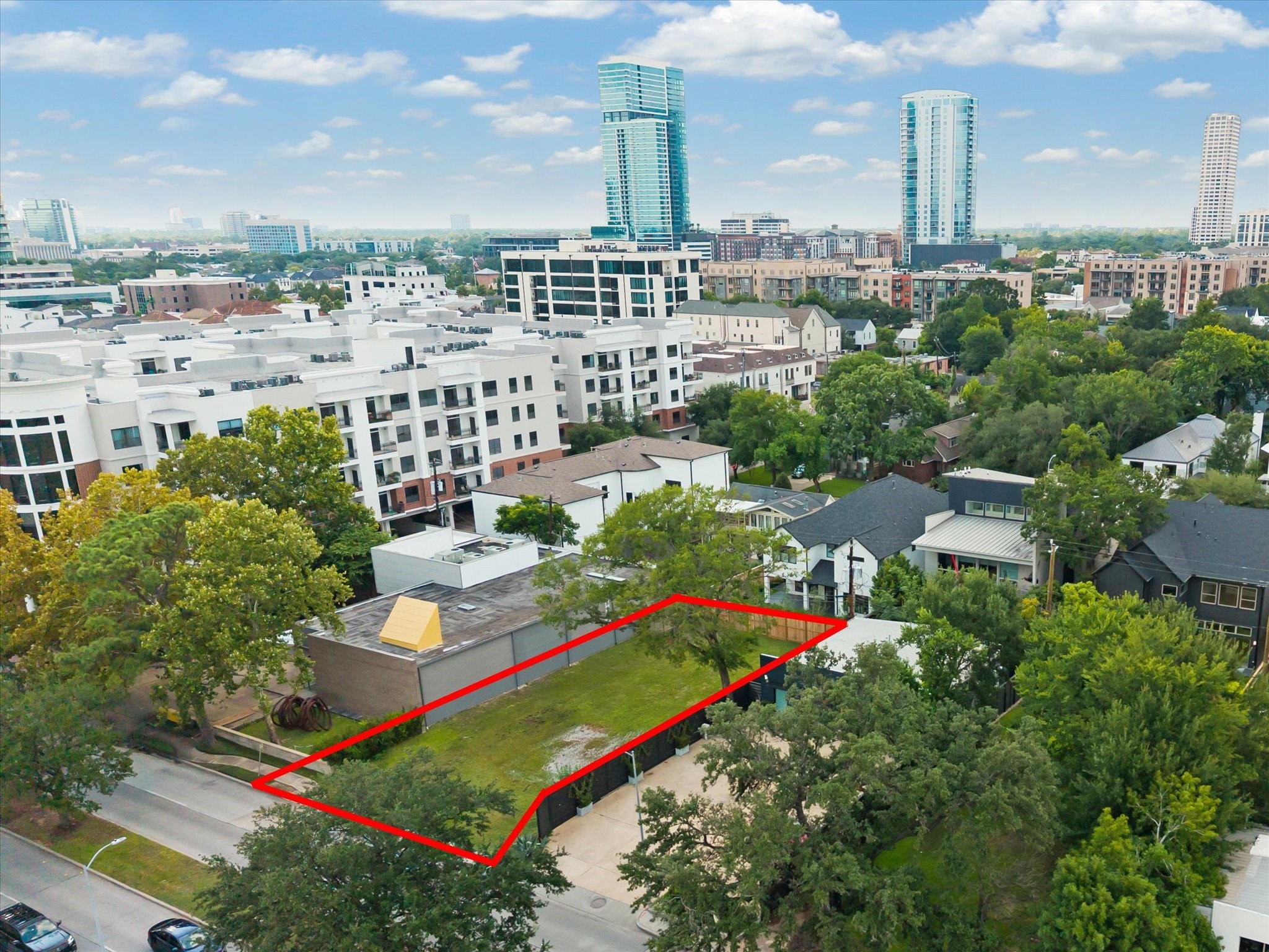 2238 Richmond Avenue Houston, TX 77098 - Photo 2 of 14 a view of a city with tall buildings