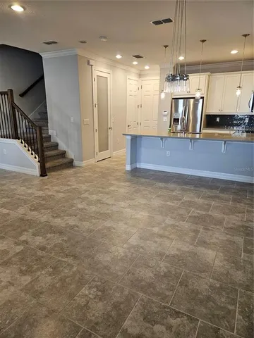 a view of a kitchen with a sink