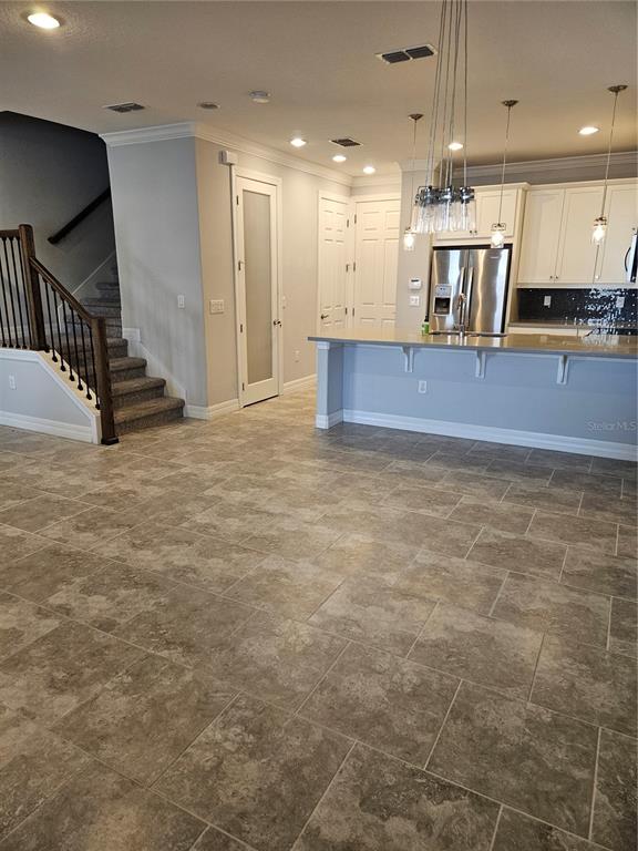 2812 Cello Lane Kissimmee, FL 34741 - Photo 2 of 34 a view of a kitchen with a sink
