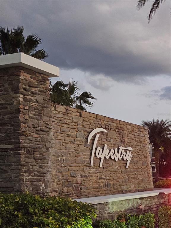 2812 Cello Lane Kissimmee, FL 34741 - Photo 33 of 34 a sign that is on the wall