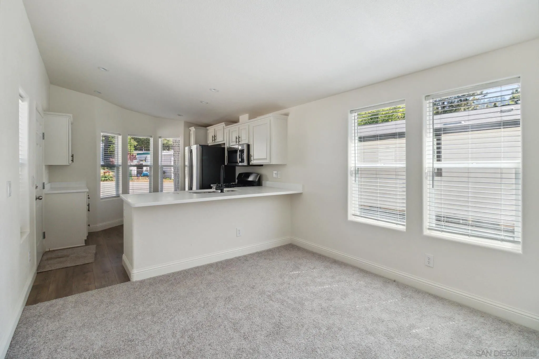 22899 Byron Road, Unit 81 Crestline, CA 92325 - Photo 5 of 9 a kitchen with cabinets and window