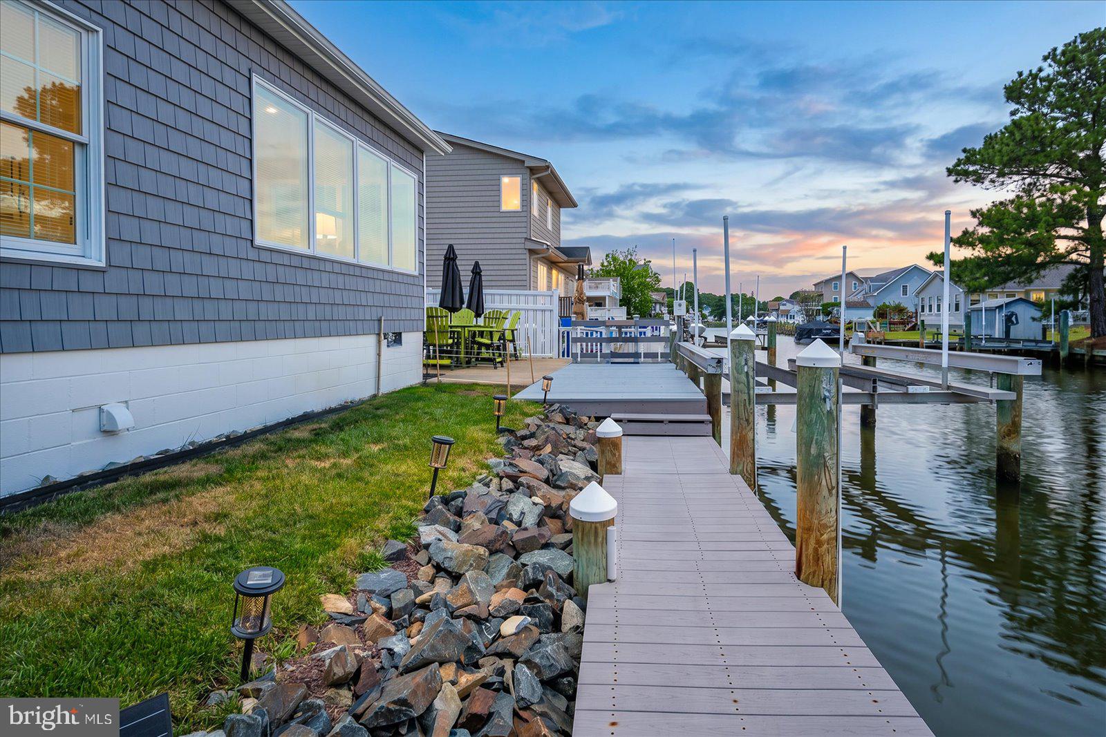 10362 Keyser Point Road Ocean City, MD 21842 - Photo 3 of 51 Charming waterfront retreat at dusk.