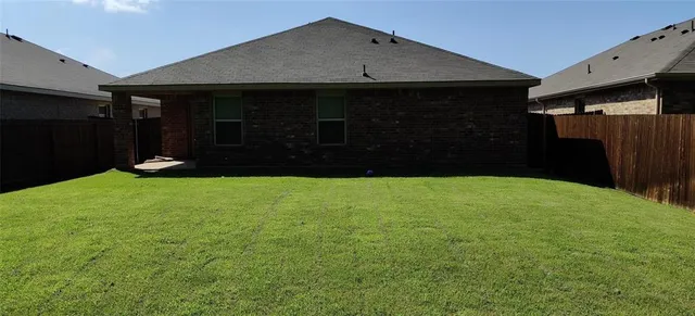 a front view of a house having yard