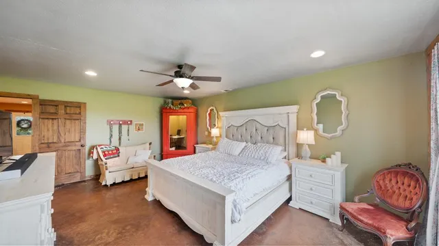 a bedroom with a bed and furniture