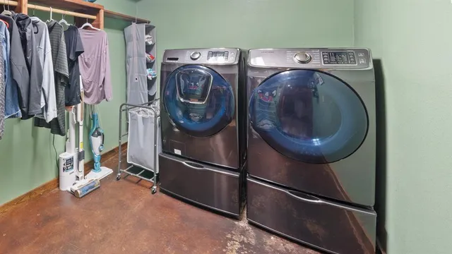 a utility room with dryer and washer