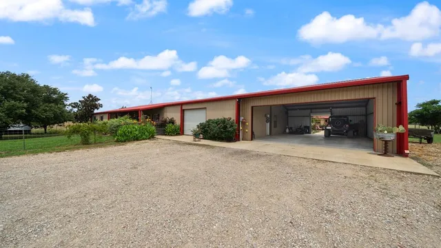 a view of backyard with green space