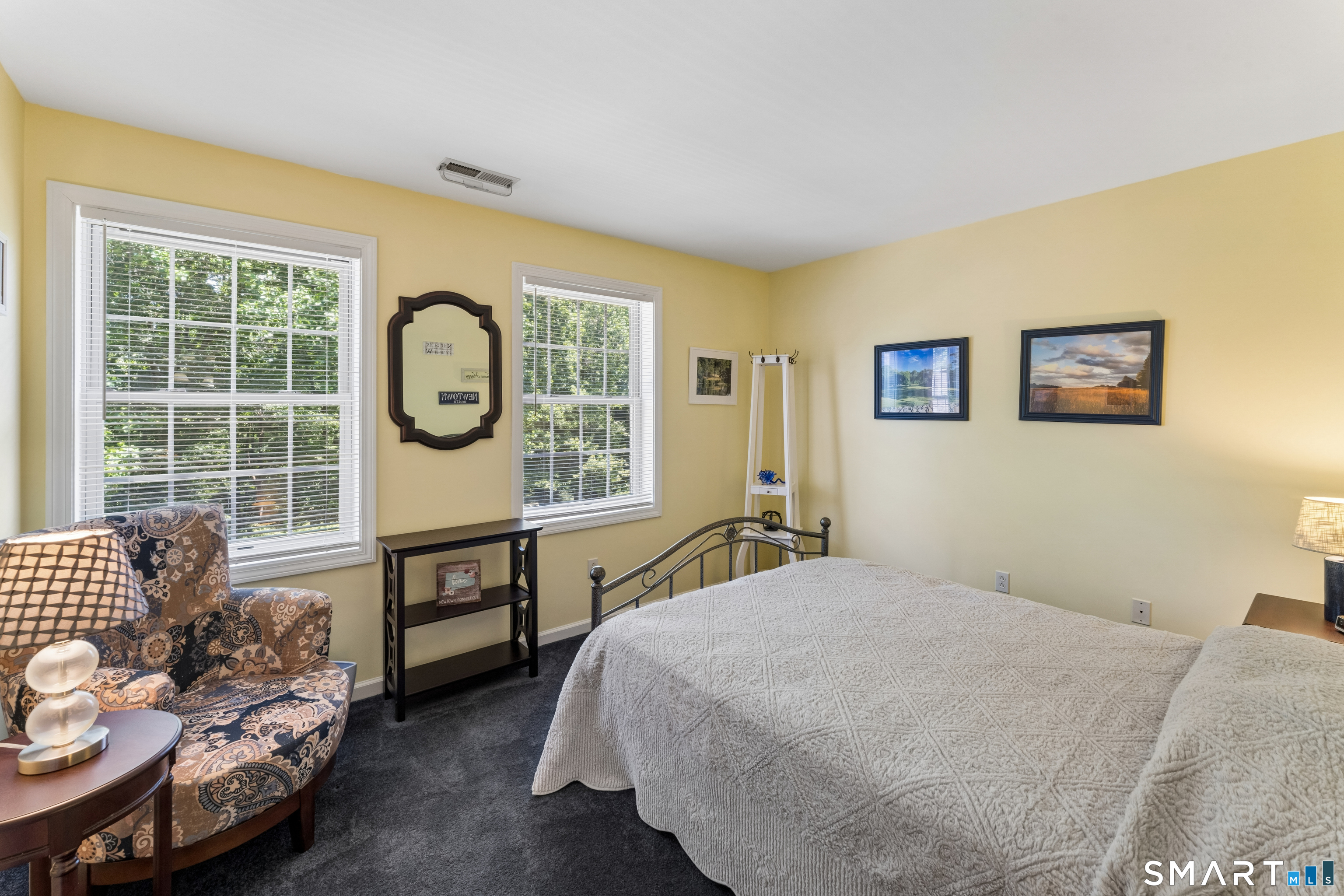 10 Ferris Road Newtown, CT 06470 - Photo 28 of 40 a bedroom with a bed and a window