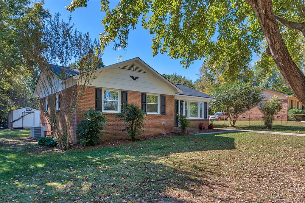 1705 Rushing Street, Unit 38 Monroe, NC 28112 - Photo 2 of 21 front view of a house with a yard