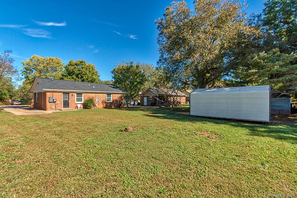 1705 Rushing Street, Unit 38 Monroe, NC 28112 - Photo 16 of 21 a front view of house with yard and trees