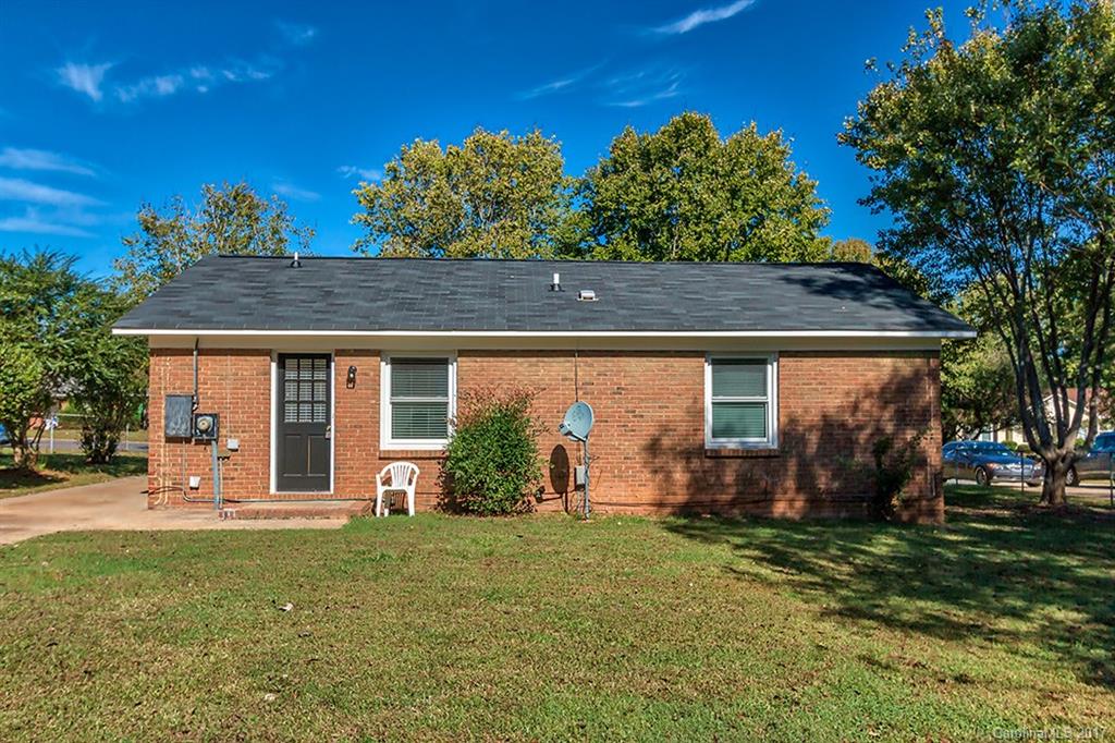 1705 Rushing Street, Unit 38 Monroe, NC 28112 - Photo 18 of 21 front view of house with a yard
